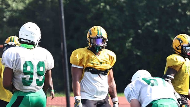 Taft defensive lineman Drayden Pavey lines up during the Senators' scrimmage at Anderson, Friday, Aug. 4, 2023.